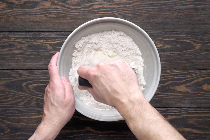 Flour mixing in a large bowl