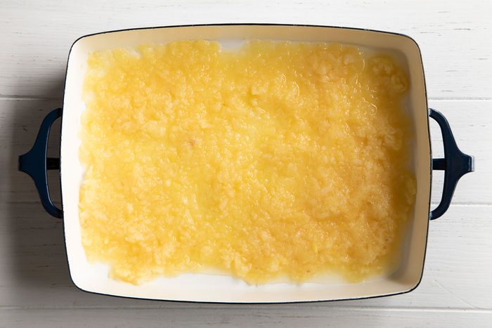 add fruit to the baking dish for dump cake