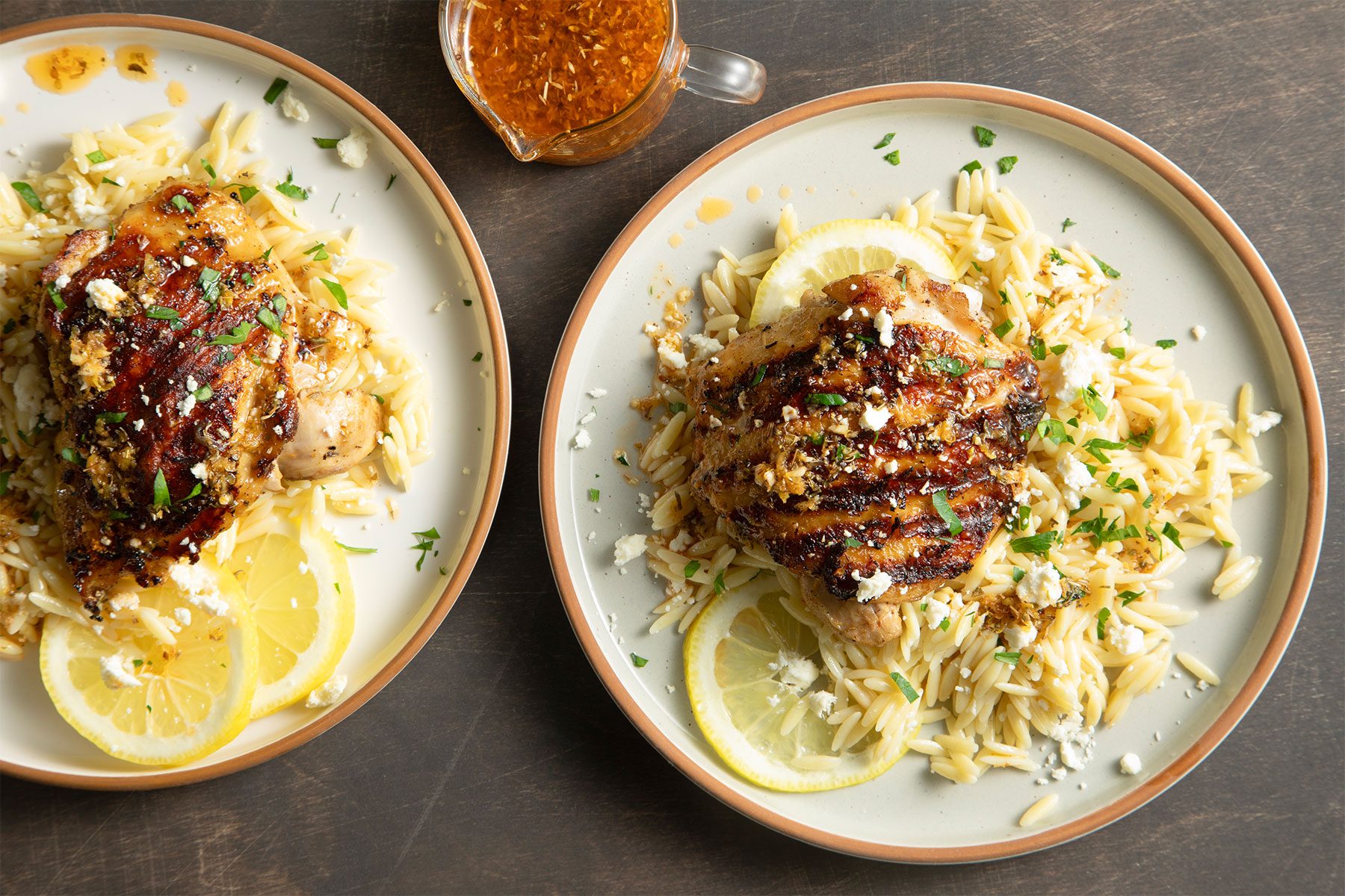 Greek Lemon Chicken served with rice and lemon slices