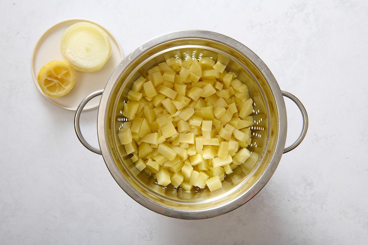 Potatoes draining in a colander