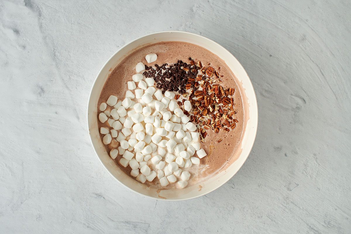 Add topping ingredients to ice cream base