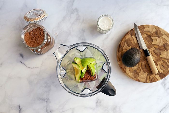 Ingredients for making Avocado Chocolate Mousse in a blender