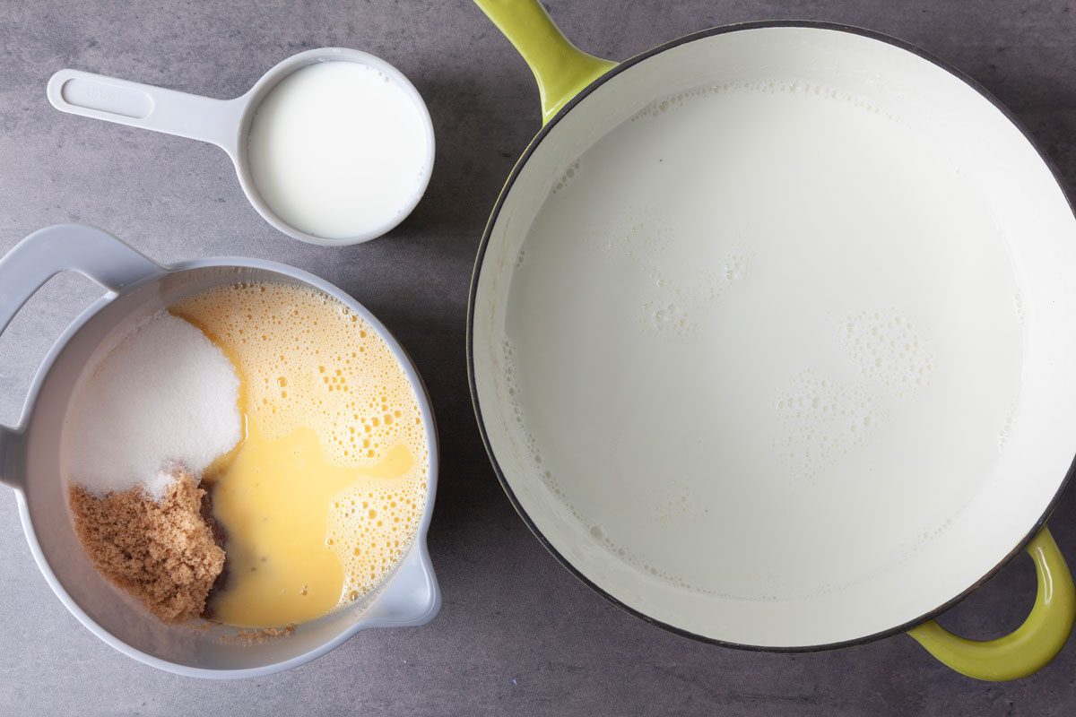 Step 1 of Taste of Home Caramel Pudding is scalding milk and adding flour, sugar and brown sugar to beaten eggs before tempering eggs with a little hot milk and returning all to the pan
