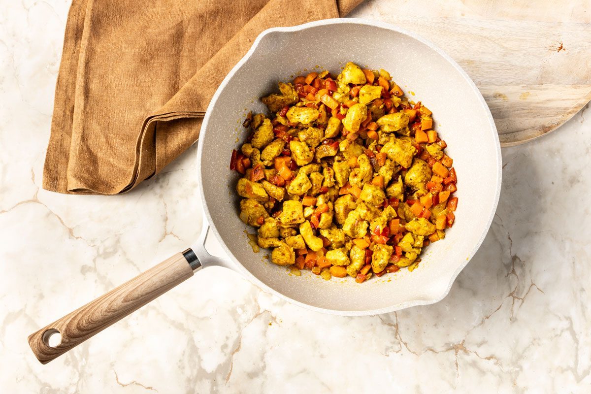 sautéing chicken and vegetables for Chicken Curry Soup