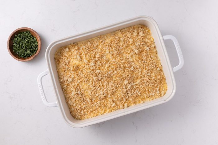 Casserole in baking dish assembled and ready to be baked.