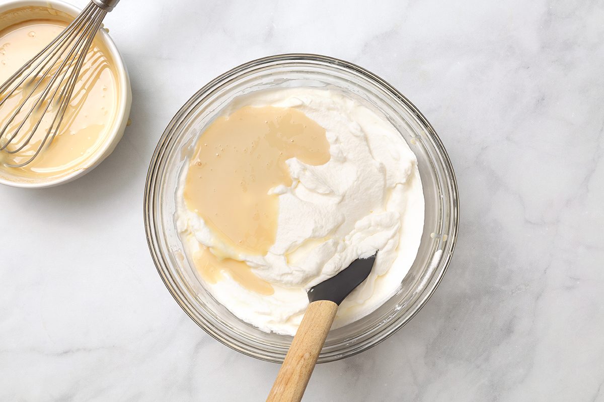 Mix of heavy cream, sweetened condensed milk and vanilla in a bowl for 3 Ingredient Ice Cream