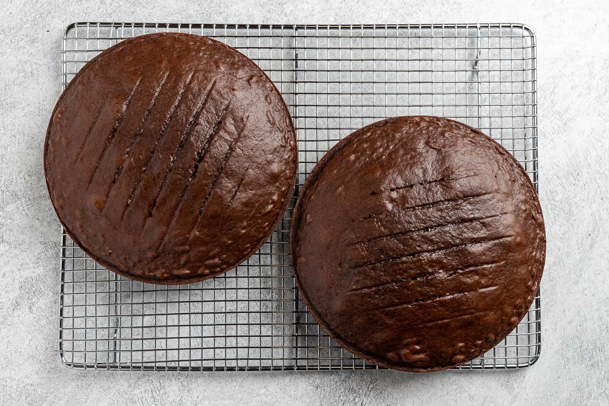 Taste of Home Almond Joy Cake recipe photo of the baked cake layers cooling on a rack.
