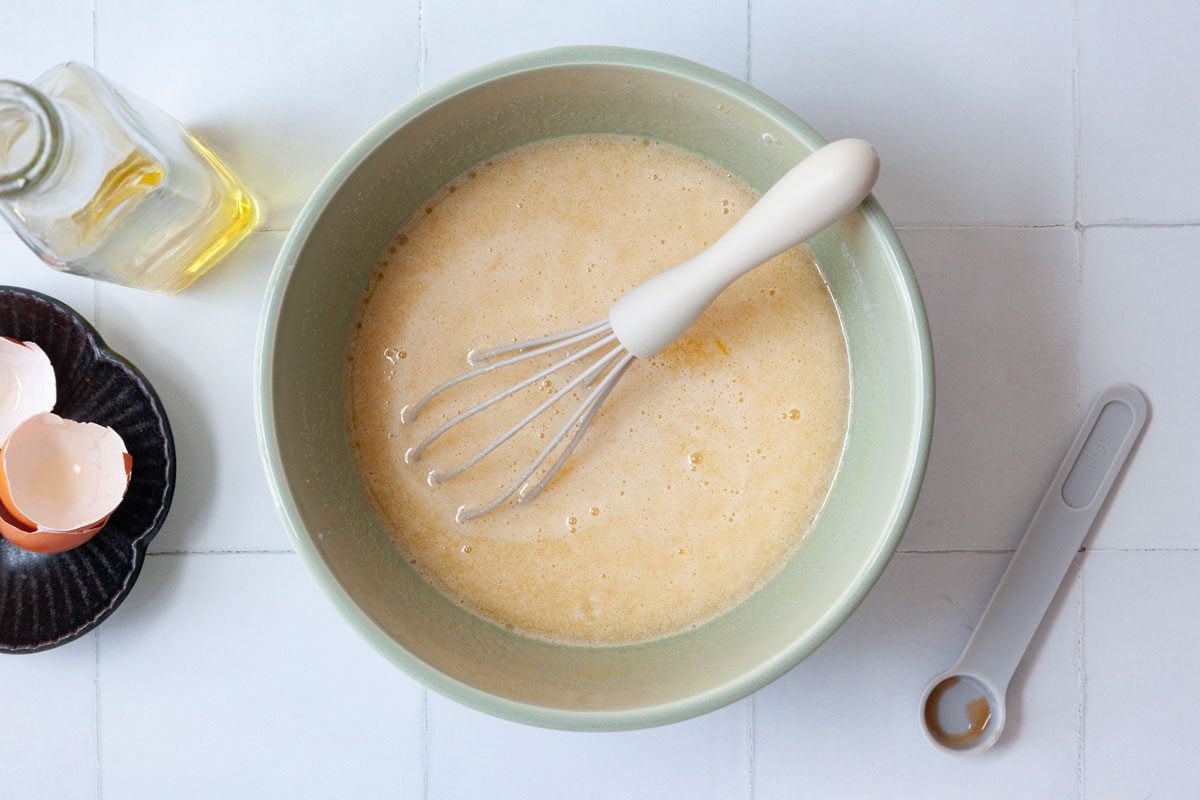 Step 3 of Taste of Home Apple Spice Cake is to combine the eggs, oil and vanilla