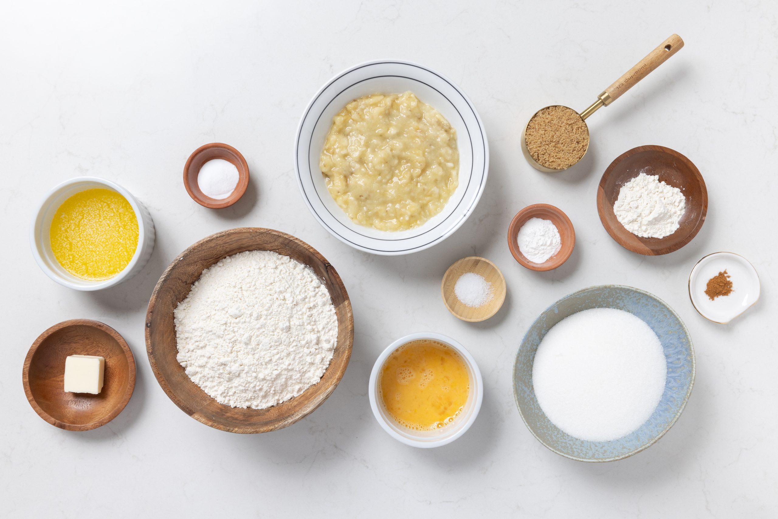 Ingredients for banana crumb muffins on kitchen counter.
