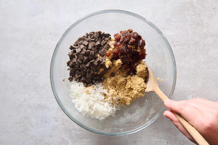 Adding the remaining breakfast cookie ingredients