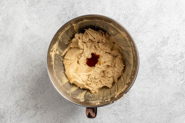 Taste of Home Chewy Peanut Butter Cookies recipe photo of adding the wet ingredients to the mixing bowl.