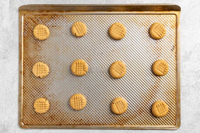 Taste of Home Chewy Peanut Butter Cookies recipe photo of forming the cookies.