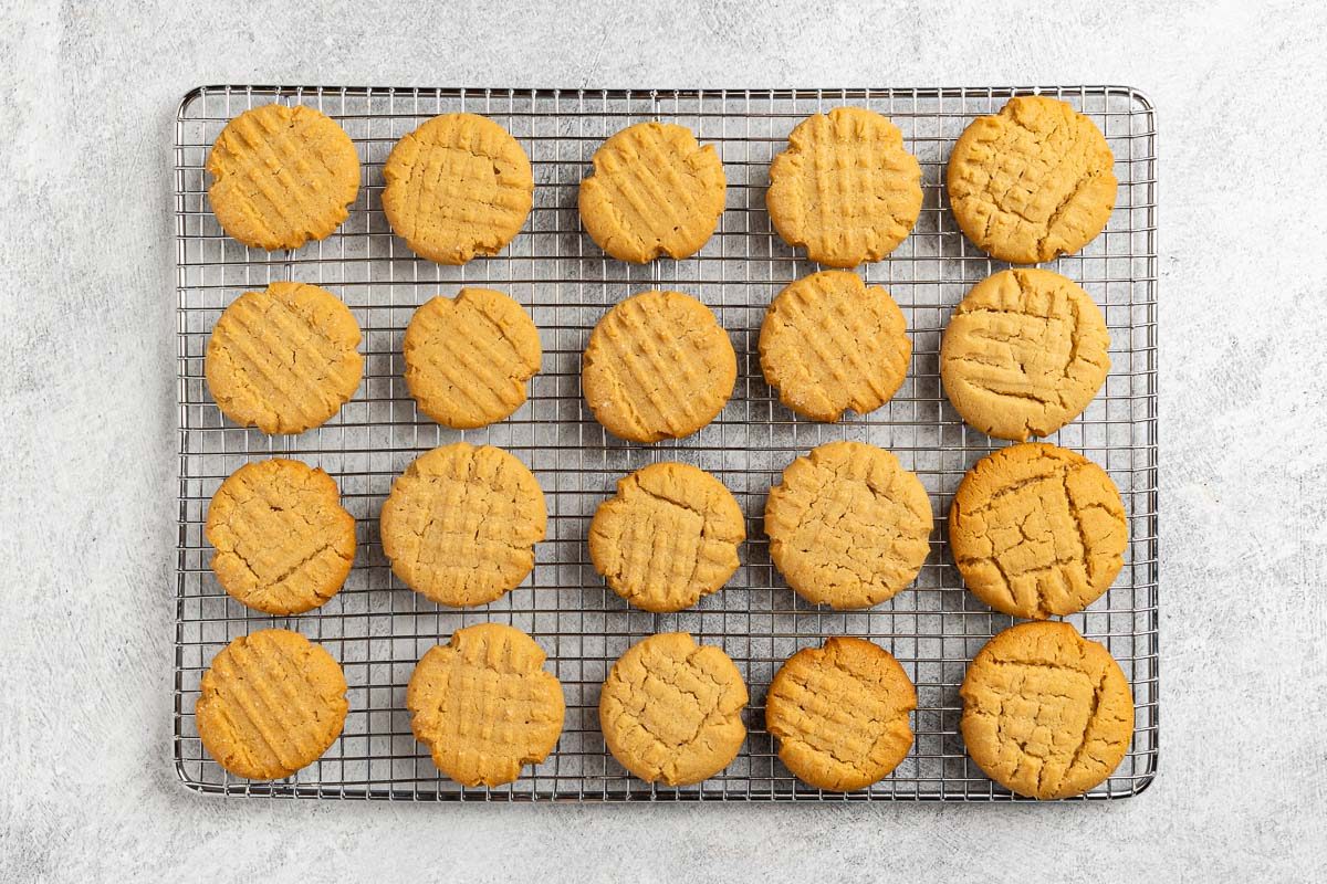 Taste of Home Chewy Peanut Butter Cookies recipe photo of the baked cookies cooling on a rack.