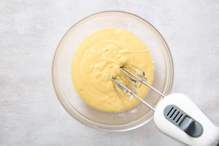 Whisking the vanilla pudding in a bowl
