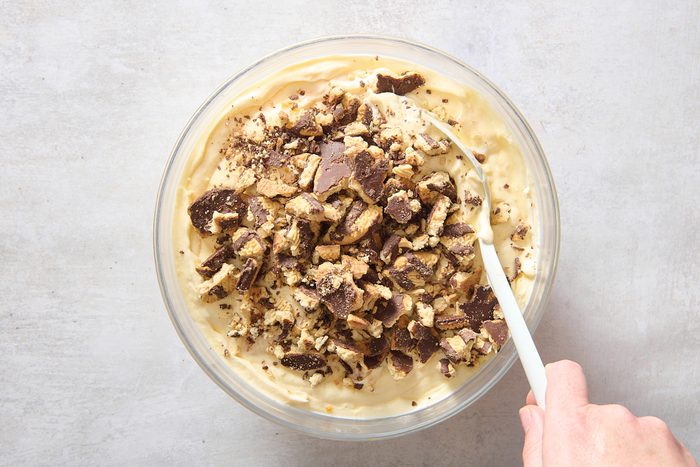Stirring in the fudge cookies