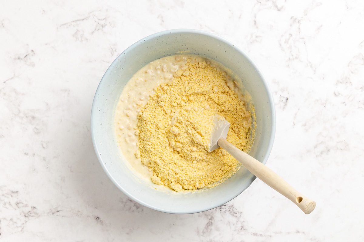 Taste of Home Cornbread Pudding recipe photo of combing ingredients in a mixing bowl.