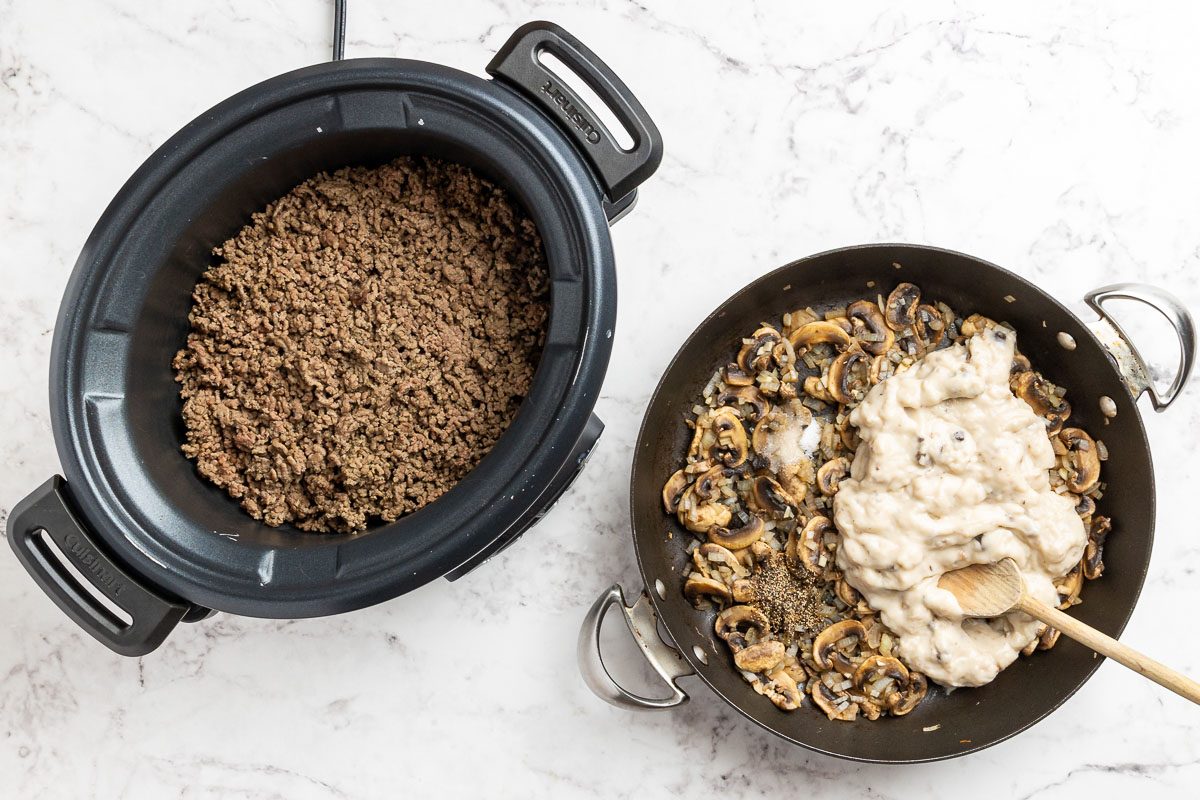 Taste of Home Crock Pot Tater Tot Casserole recipe photo of ground beef in the crockpot while the onion, mushrooms, garlic and condensed soup are in a skillet.