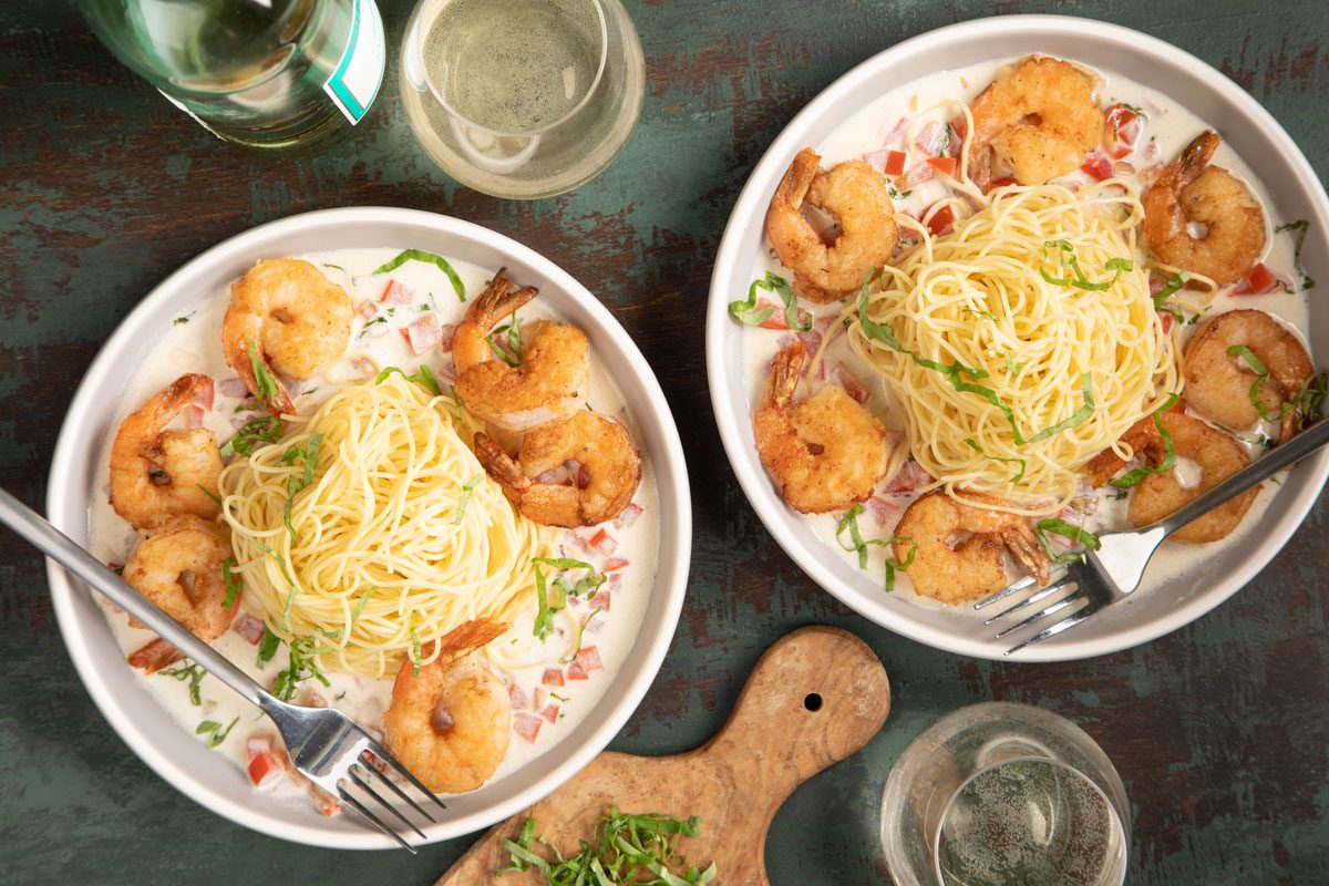 Copycat Cheesecake Factory Shrimp Scampi served on two plates