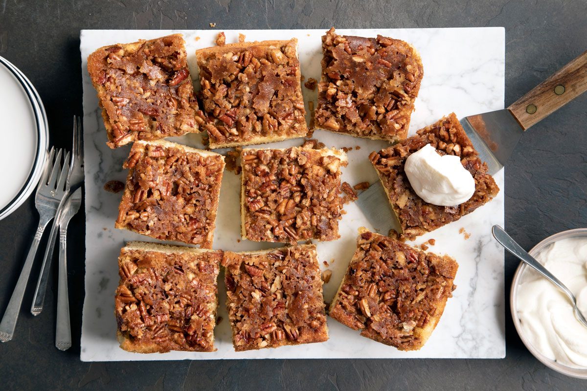 Pecan Upside Down Cake slices on a cutting board