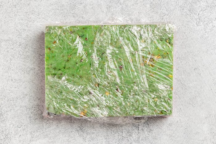 Taste of Home Italian Spumoni Cookies recipe photo of dough layered into a rectangles and wrapped for refrigeration.