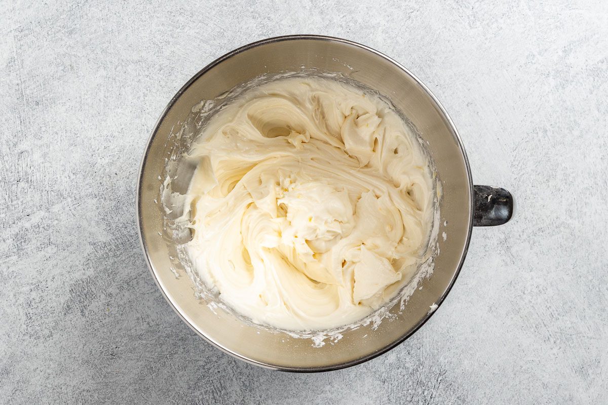 Taste of Home Lemon Raspberry Cake recipe photo of the cream cheese frosting.