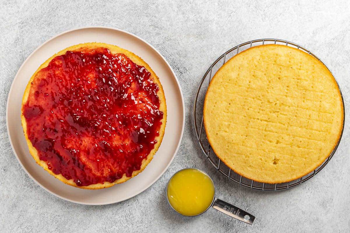 Taste of Home Lemon Raspberry Cake recipe photo assembling the cake.