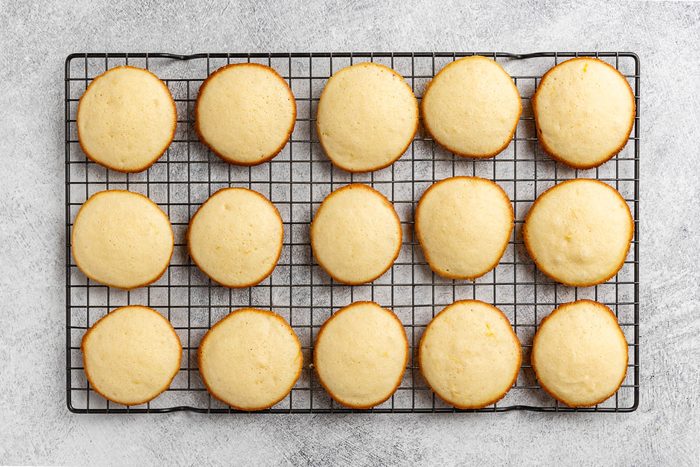 Taste of Home Lemon Ricotta Cookies photo of the cookies baked and cooling on a rack.