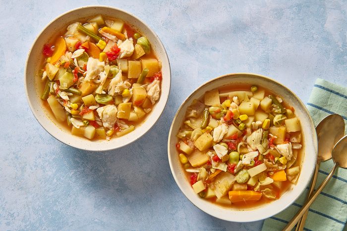 Overhead shot of two bowls of Maryland crab soup
