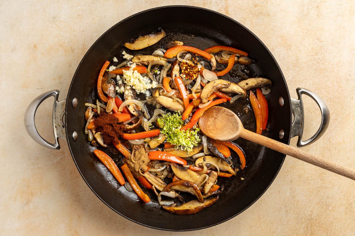 Taste of Home Mushroom Tacos recipe photo of the spices, garlic, lemon juice and zest added to the sauteed veggies.