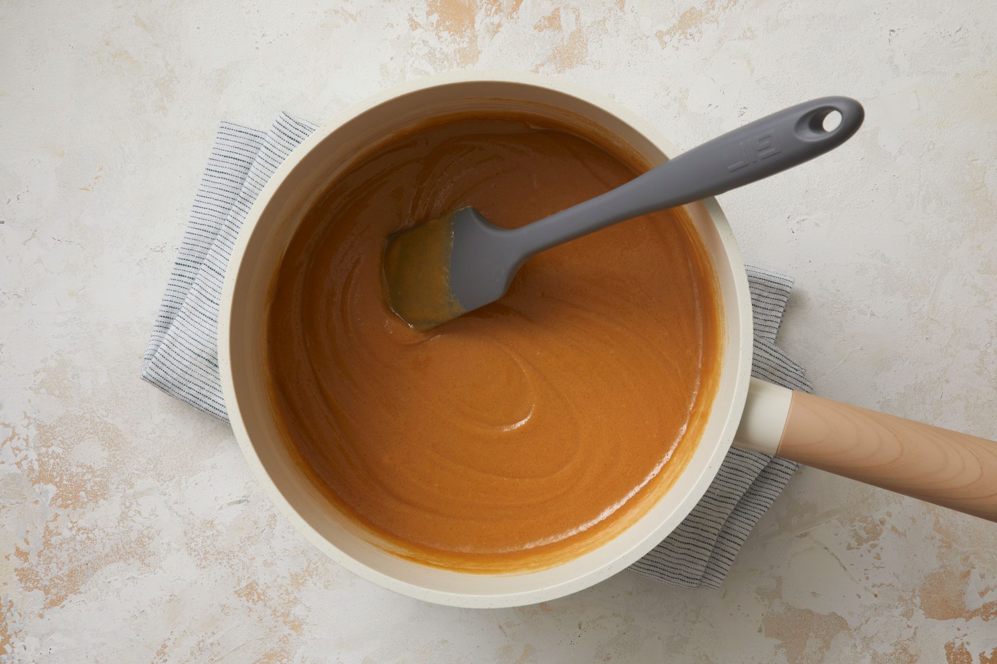 Stir in peanut butter and vanilla until smooth