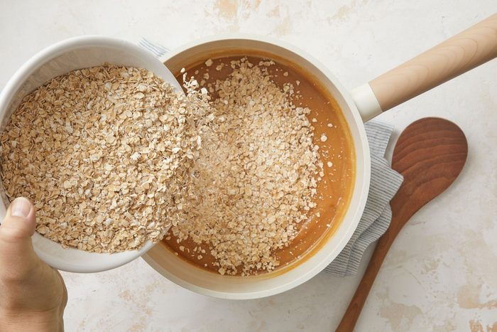 Adding oats in the peanut butter mix