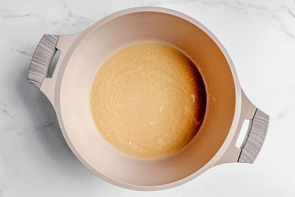 Roux For Taste Of Home Okra Gumbo In A Dutch Oven On A Marble Surface.