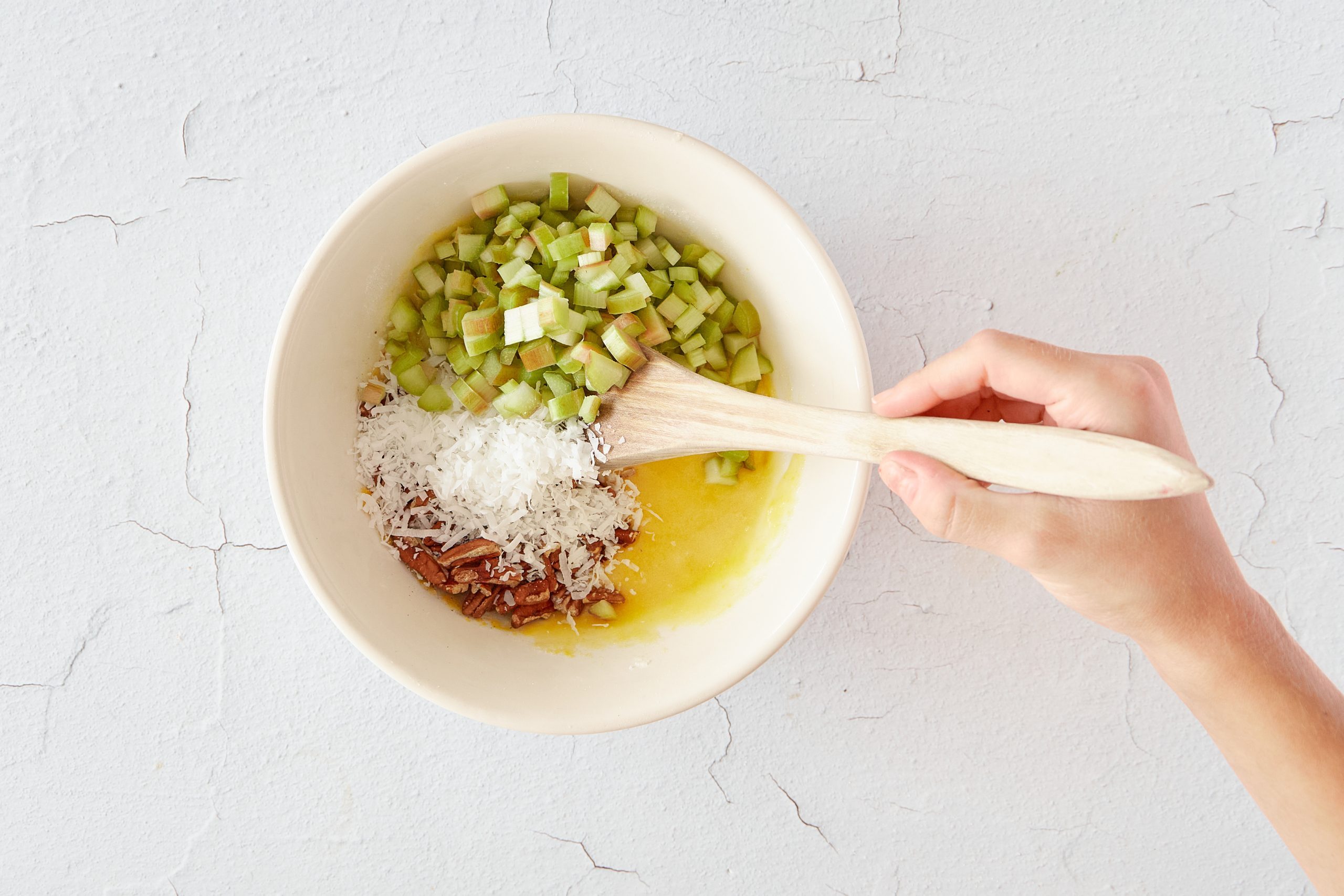 Prepare the rhubarb filling for rhubarb bars.