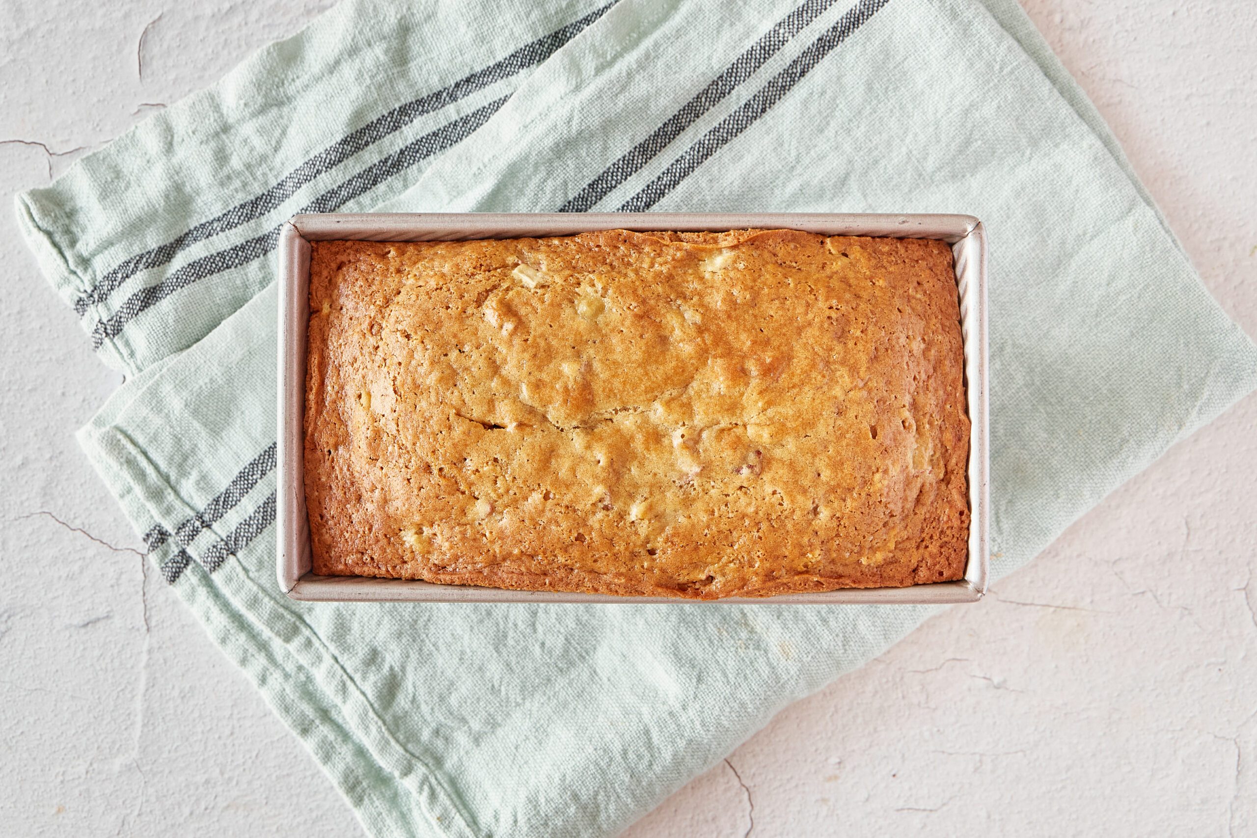 Rhubarb bread is a delicious loaf cake studded with rhubarb.