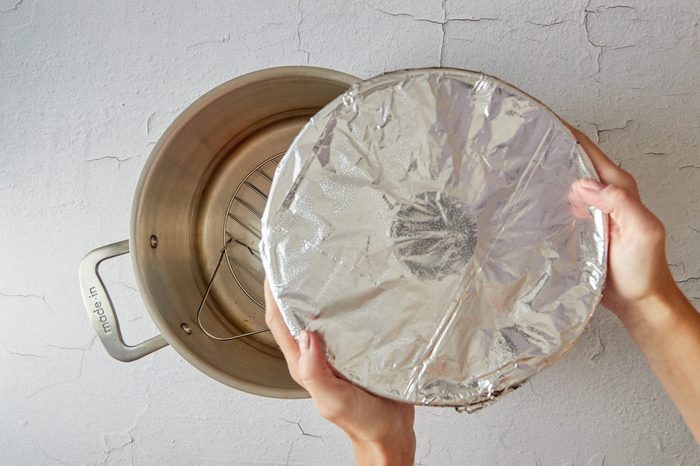 Steam the plum pudding.