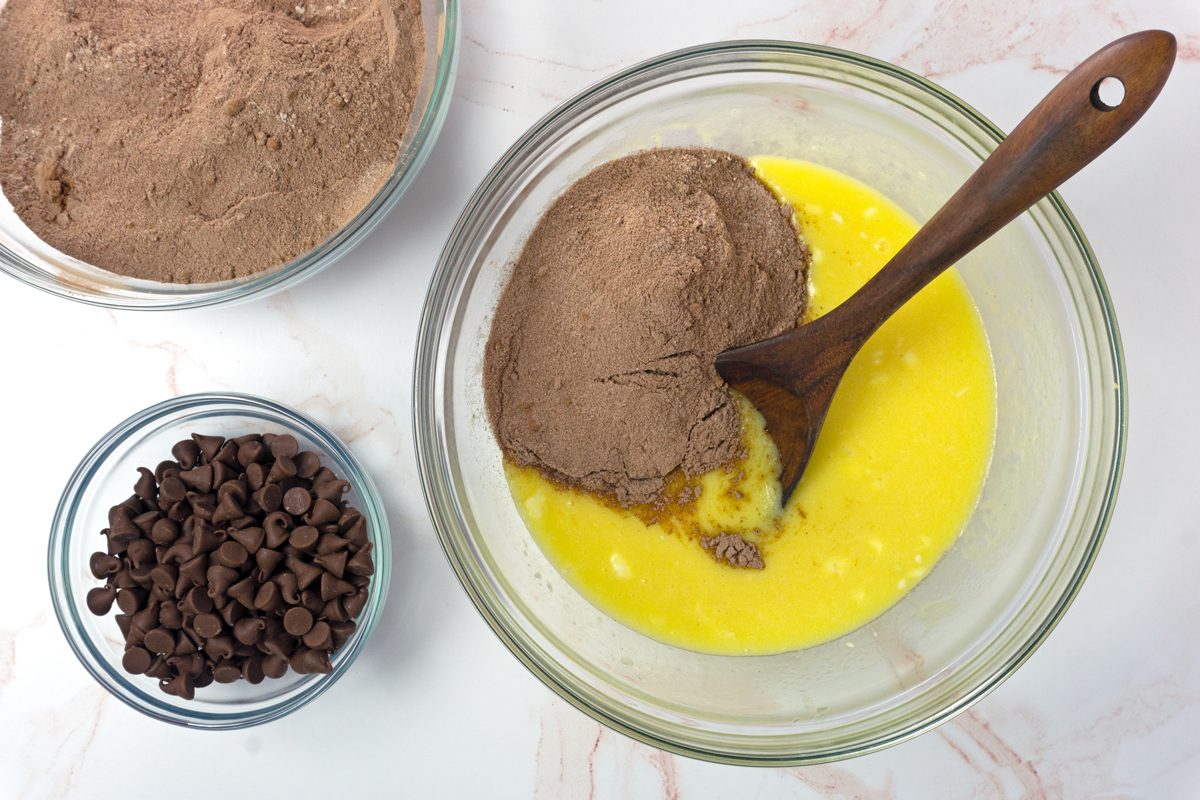 Mixing bowls containing wet and dry ingredients for peanut butter swirl brownies for Taste of Home RMS 11889