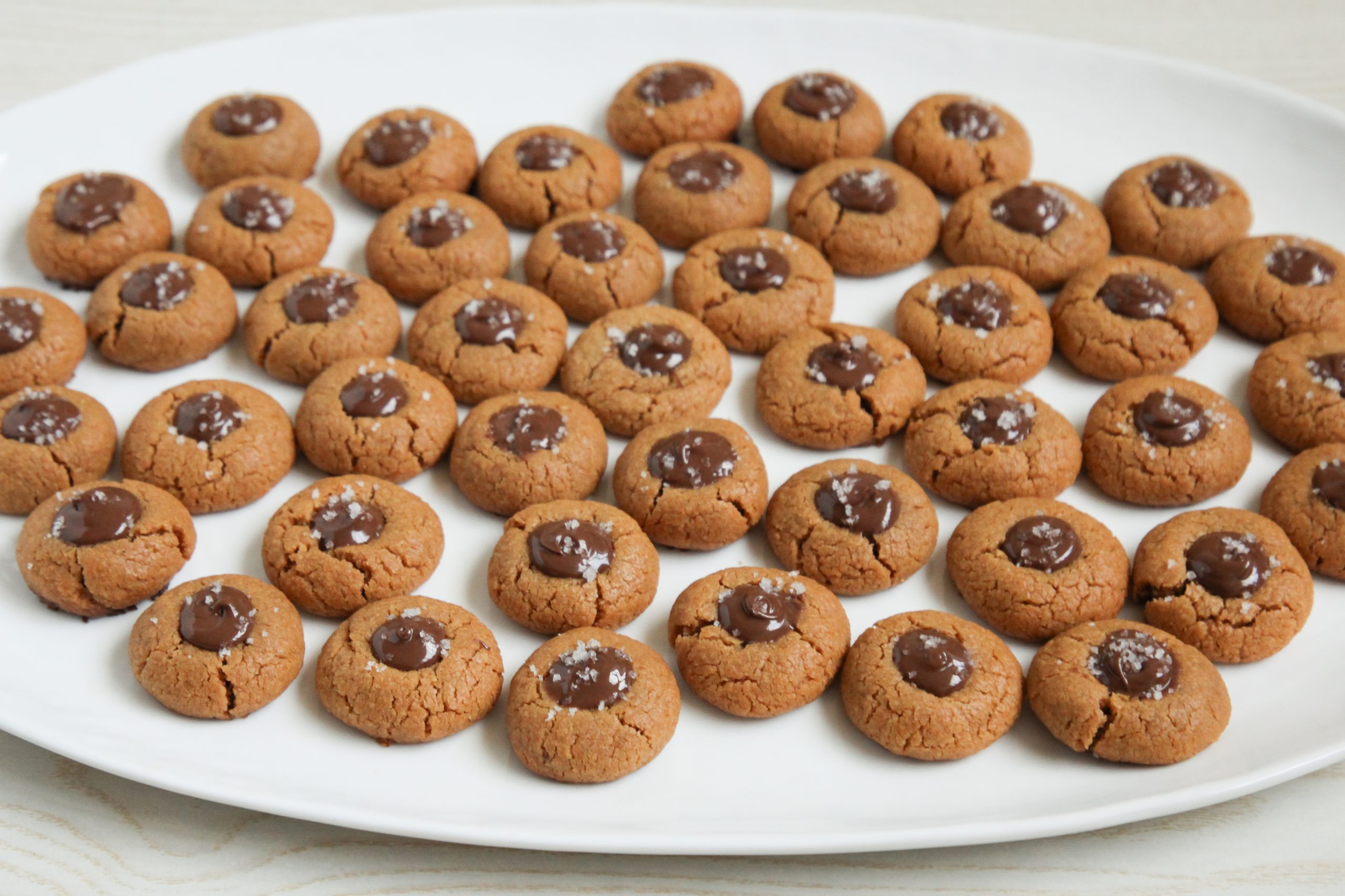Peanut butter thumbprint cookies filled with Nutella