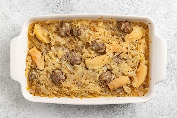 Taste of Home Sauerkraut Casserole recipe photo of the baked casserole in a baking dish.