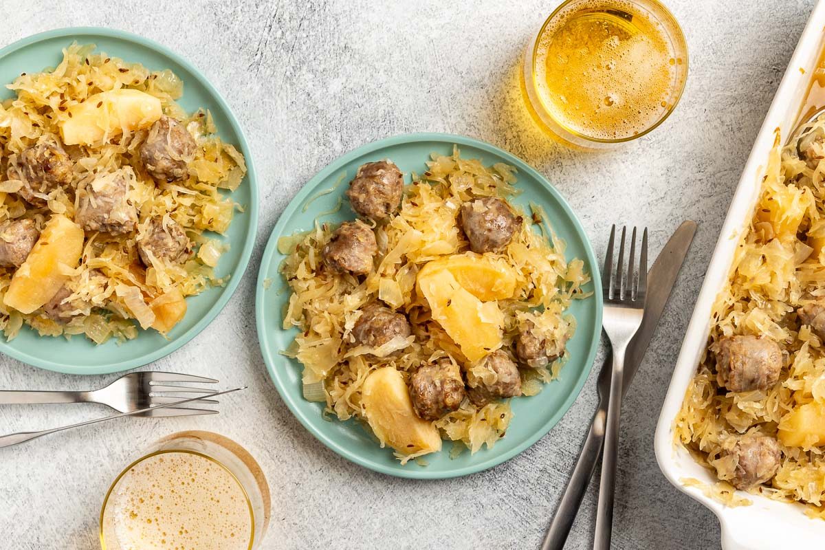 Taste of Home Sauerkraut Casserole recipe photo of the finished recipe served on plates.