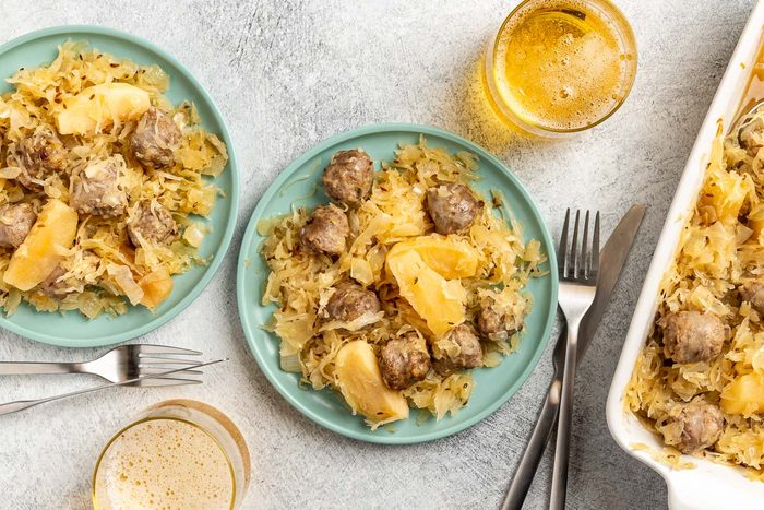 Taste of Home Sauerkraut Casserole recipe photo of the finished recipe served on plates.