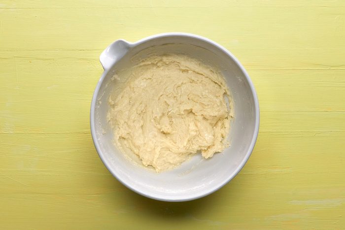 Top view shot of whisked eggs in a bowl