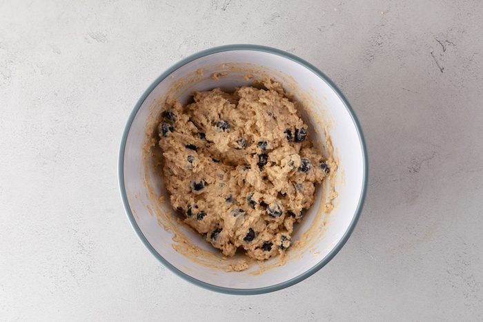 Soft Blueberry Oatmeal Muffins batter in a mixing bowl.
