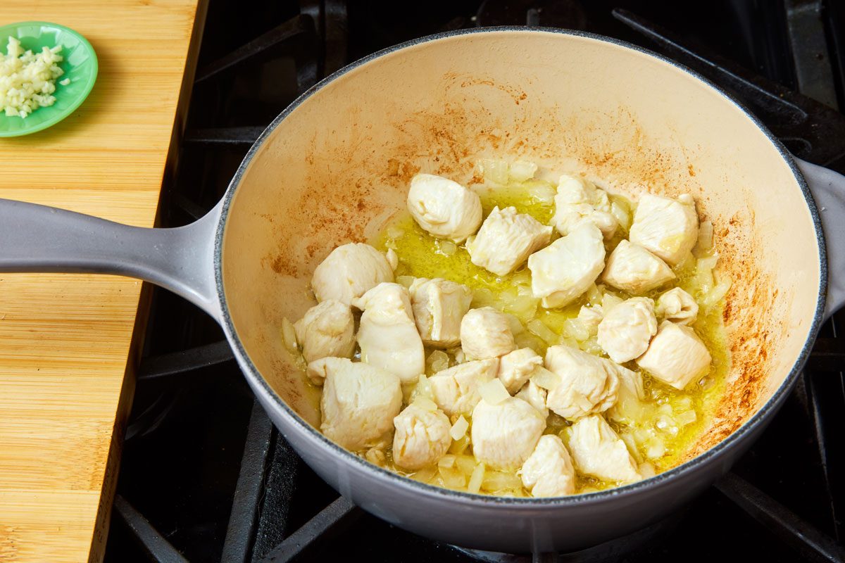 Close up of cooking chicken in skillet