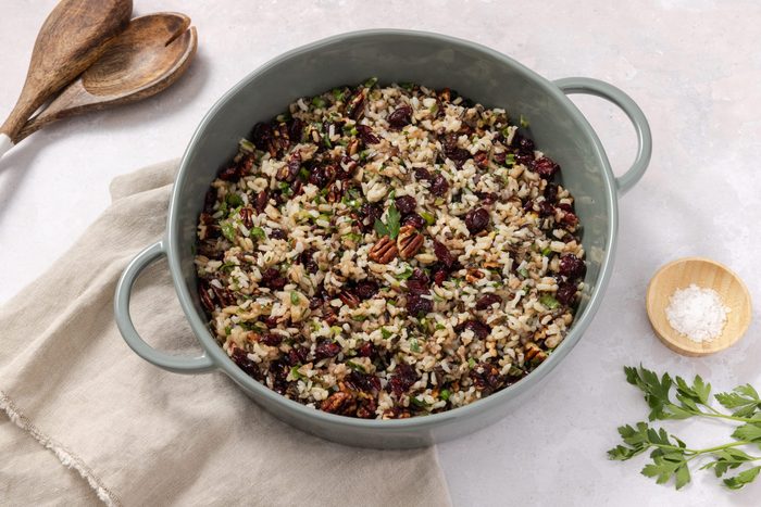 Wild rice salad in ceramic serving bowl.
