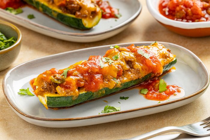 Taste of Home Zucchini Taco Boats recipe photo of the finished recipe served on plates.