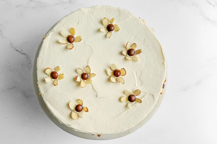 Taste of Home Amaretto Cake on a cake stand