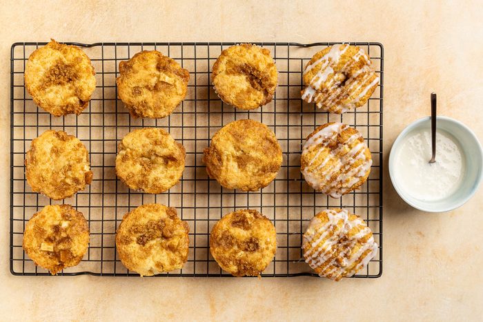 Taste of Home Apple Muffins recipe photo of the baked muffins topped with glaze.