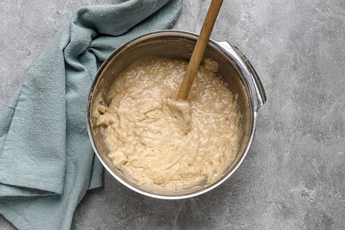 A mixing bowl with batter for banana beignets, a Taste of Home recipe.