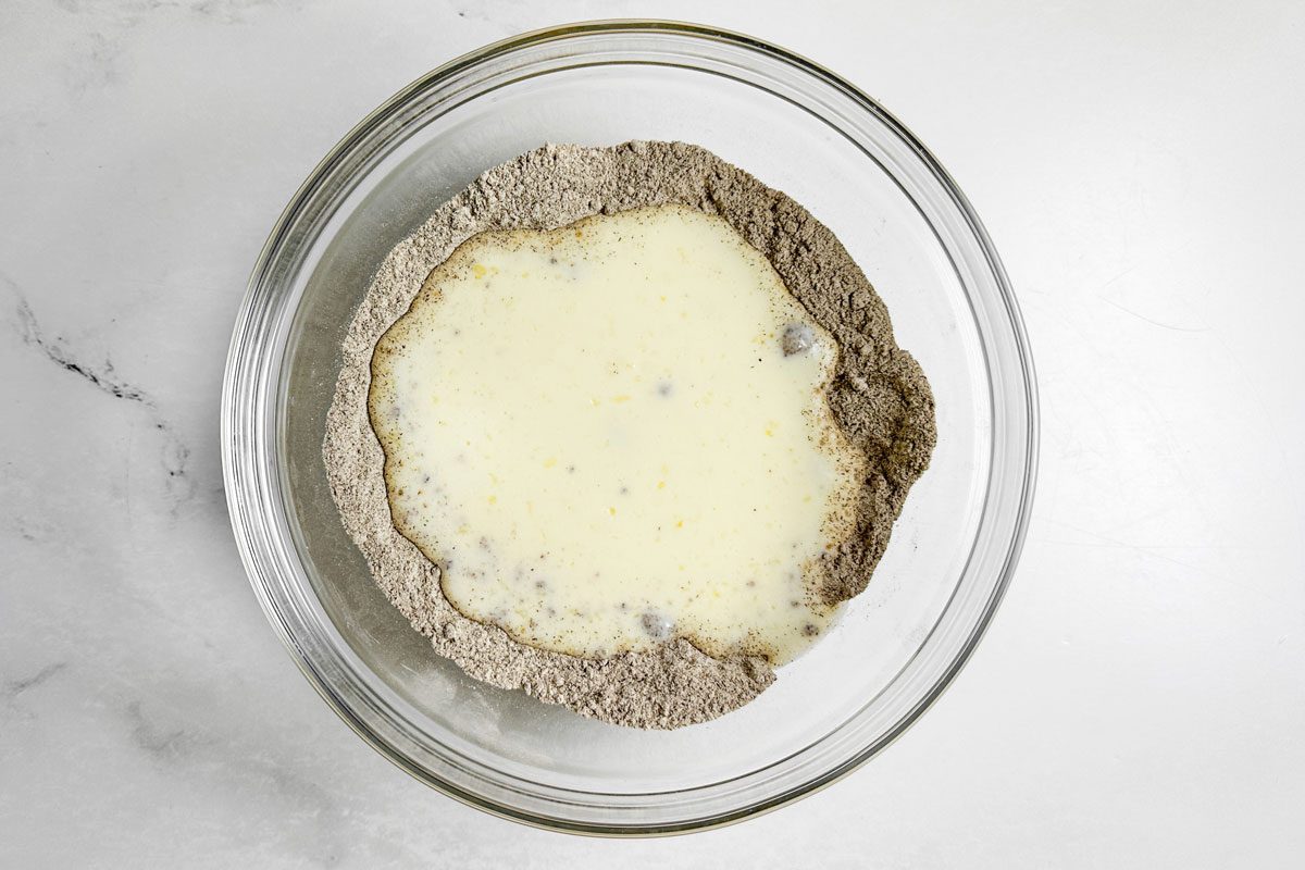 Batter for Taste of Home Buckwheat Pancakes in a glass bowl