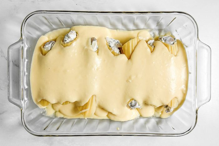 Taste of Home Chicken Manicotti in a glass baking dish